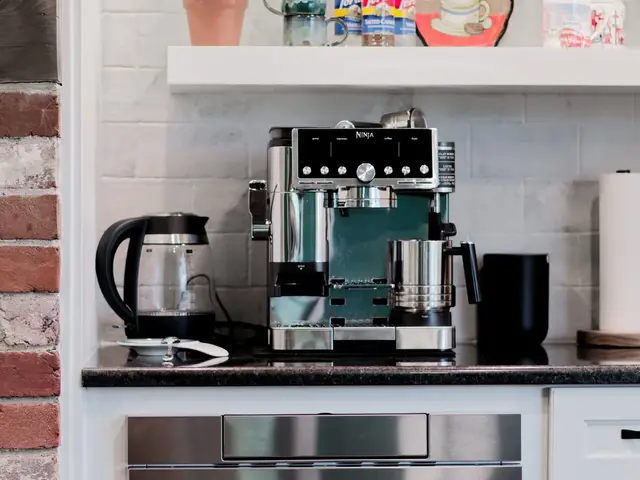 Coffee station with floating shelves, white drawers and a stainless beverage refrigerator beside the brick fireplace.